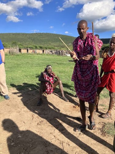 maasai man making fire