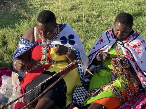 maasai women making jewelry