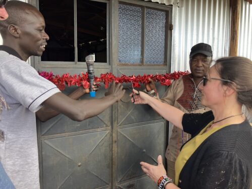 cutting ribbon at new church