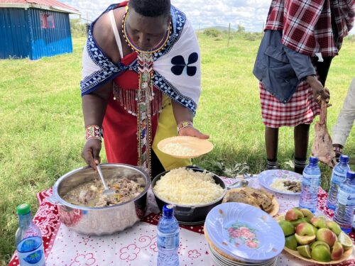 maasai women serving food